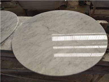 Tampo redondo de mármore de Carrara