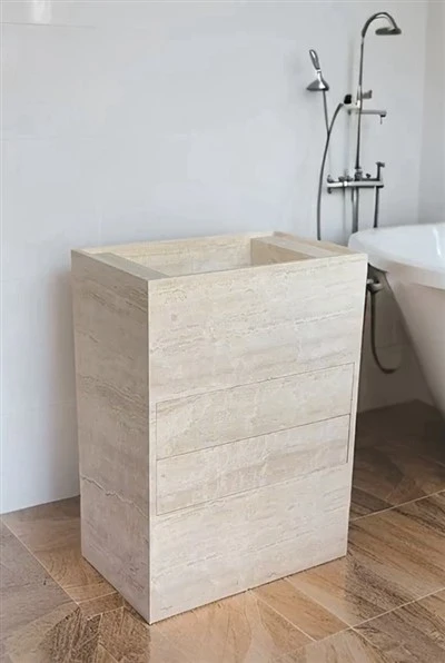 A vaidade da travertina afunda